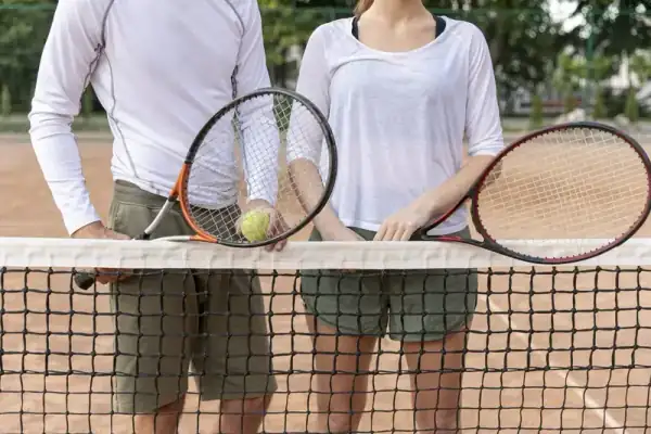 Tennis player serving